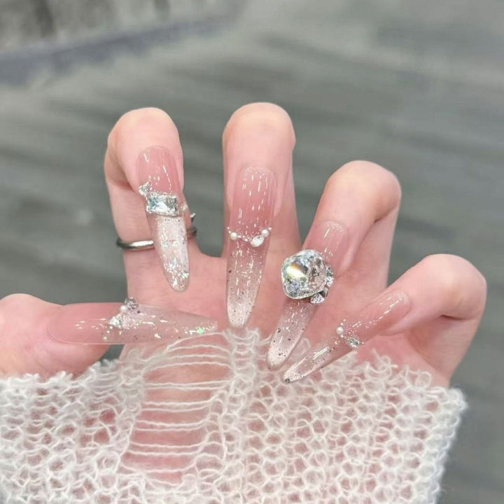 Artistic Stiletto Press-On Nail Art with Glimmering Accents Kalsten