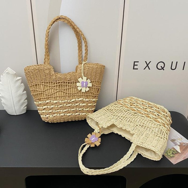 Handwoven beach bag with floral accents Kalsten