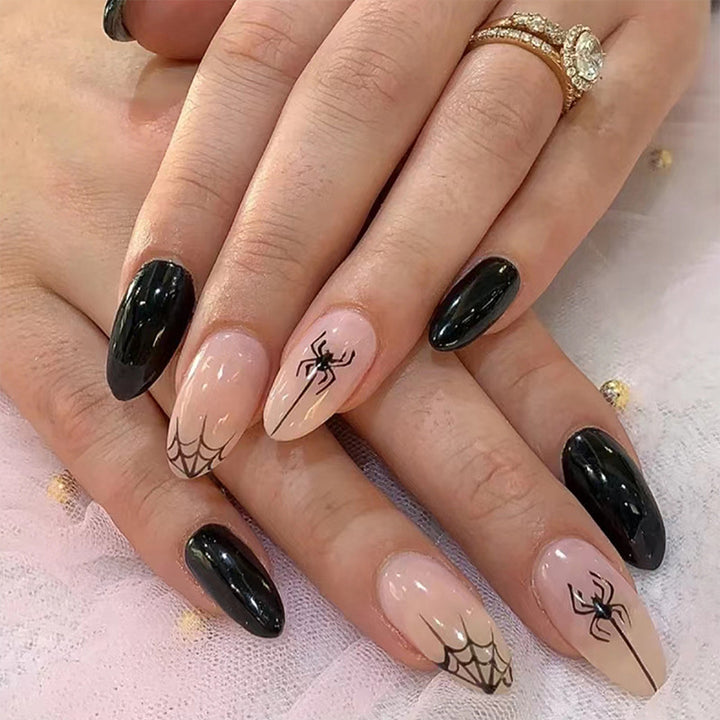 Artistic nail art with spider motif Kalsten