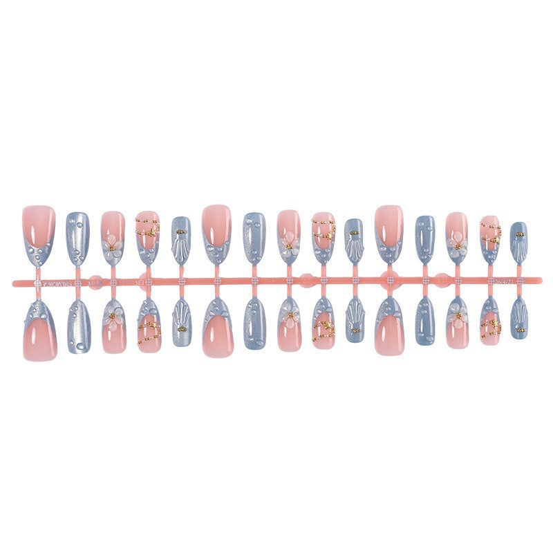 Creative acrylic nail set with elegant flower and glitter accents Kalsten