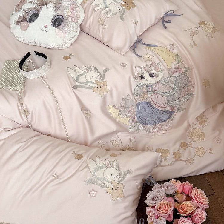 Exclusive satin bed linen set with detailed embroidery of cats and moon motif