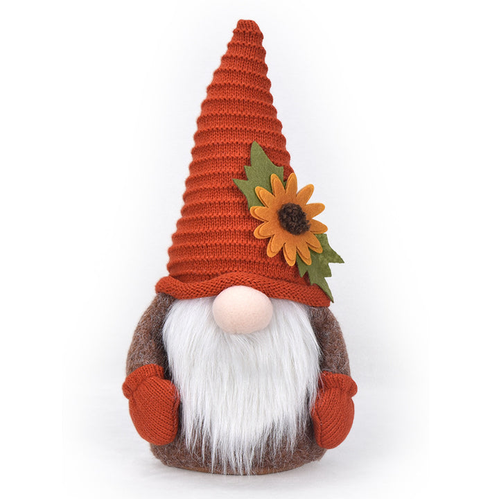 Autumn handmade decorative gnome figure with knitted hat, felt leaf application and pumpkin detail