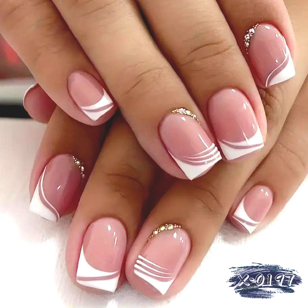 Elegant French Tip Press-On Nails with Gem Accents