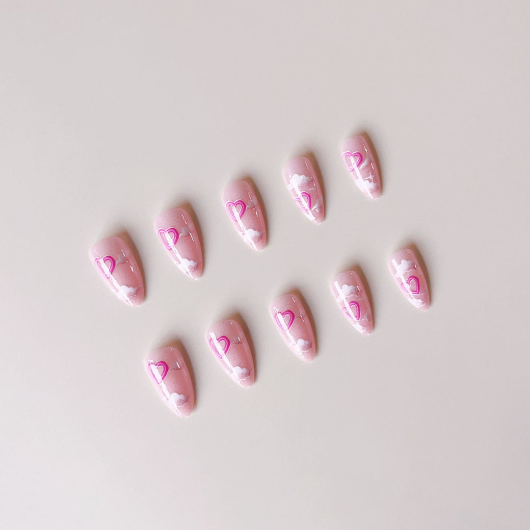 Artificial nail set with romantic heart accents and sparkling finish Kalsten