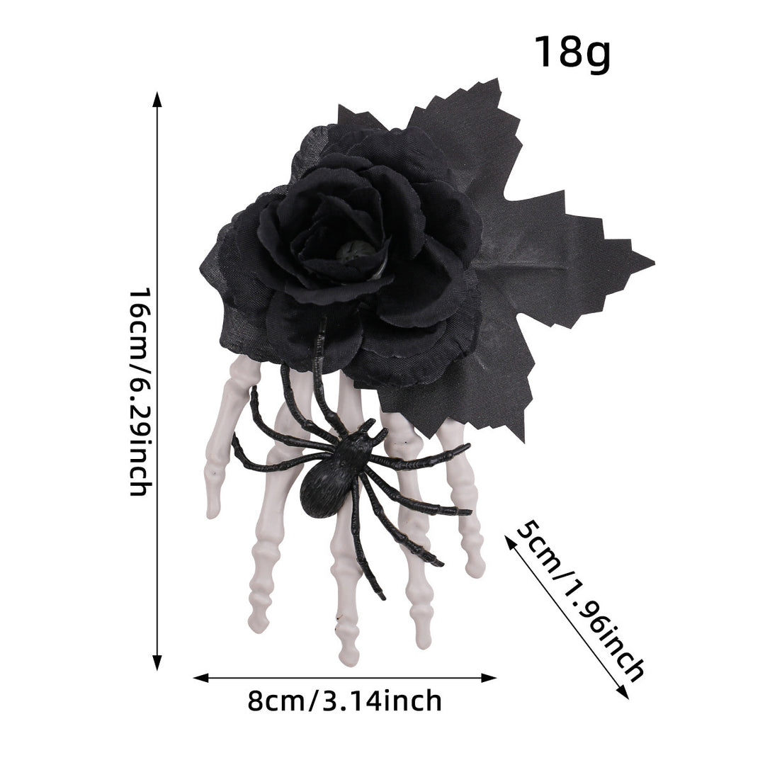 Gothic hair clip with fabric rose, skeleton fingers, and spider appliqué