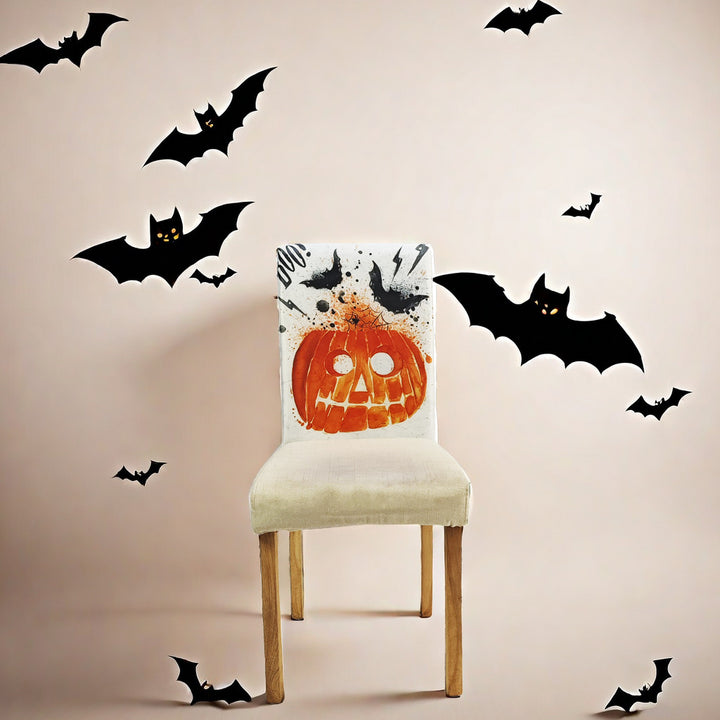 Stretch chair back cover with detailed pumpkin watercolor print and bat accents