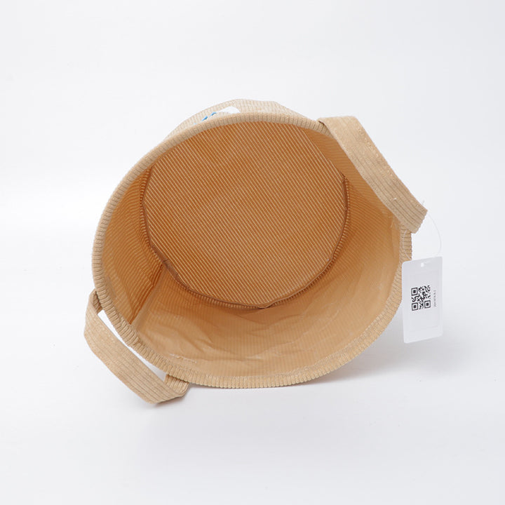 Fun storage basket with dinosaur motif