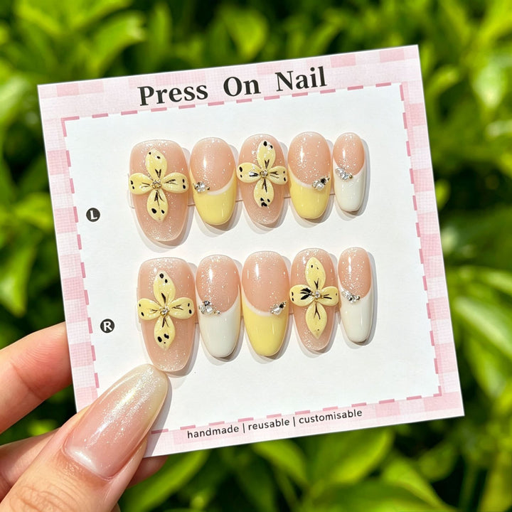 Artistic Press-On Nail Set with Tropical and Floral Accents