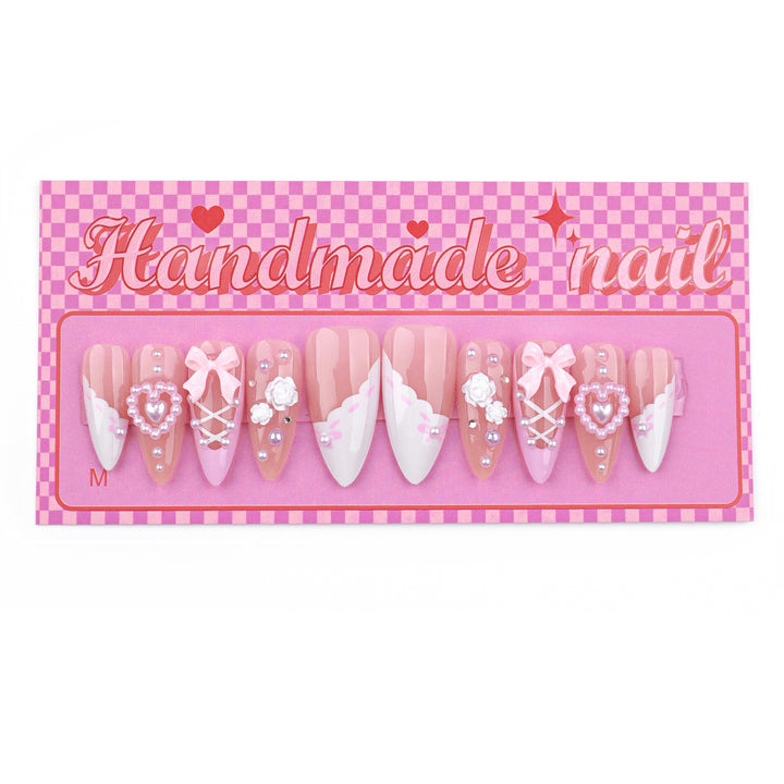 Artful stiletto nails with romantic accents Kalsten