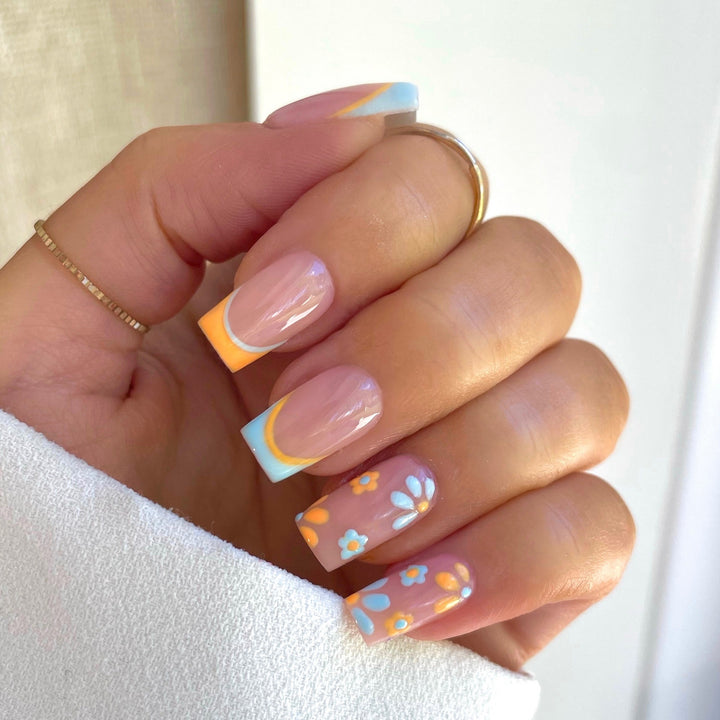 Nail art set with creative floral designs and elegant French finish Kalsten