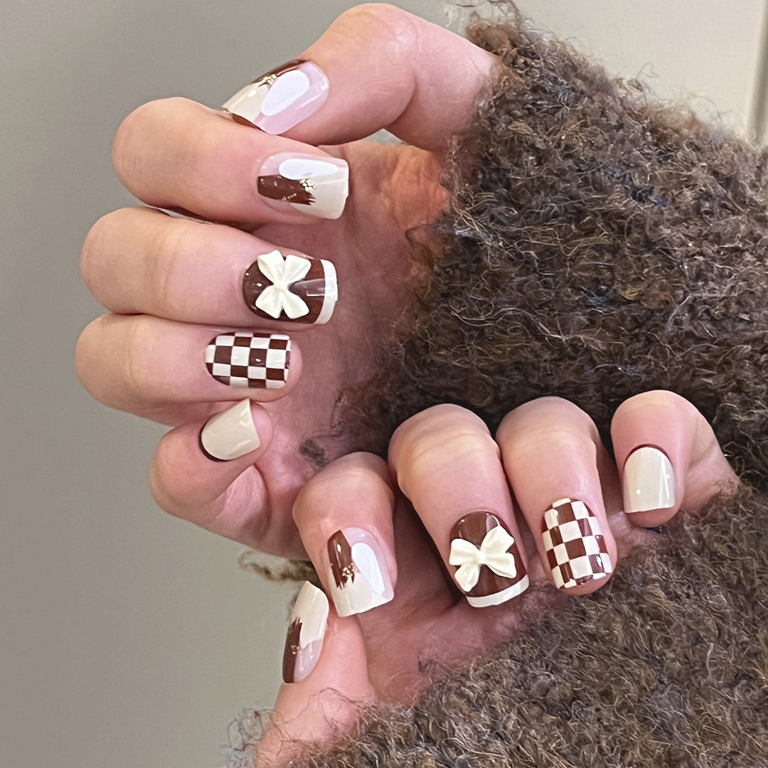 Creative Nail Art with Modern Patterns and Bow Motifs Kalsten