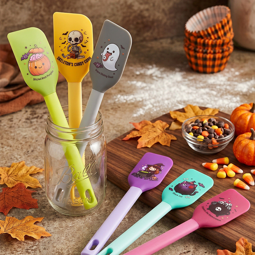 Silicone kitchen spatula with flexible scraper and child-friendly witch motif