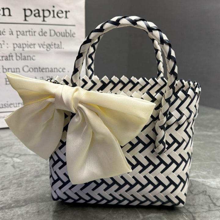 Playful basket bag with bow Kalsten
