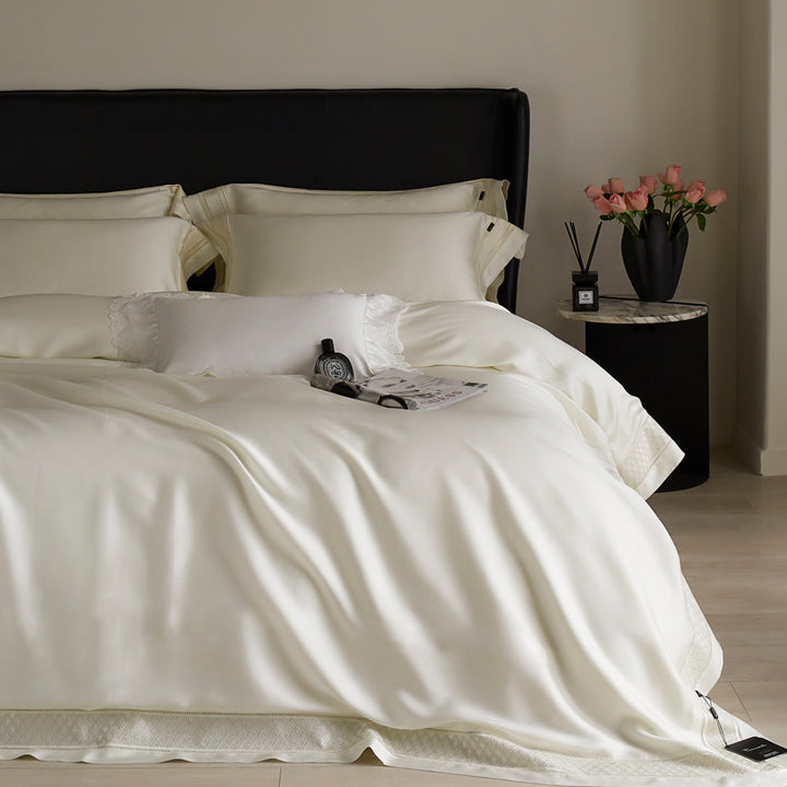 Silky flowing satin bed set with decorative cassette border and extra soft touch