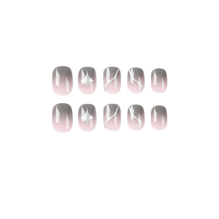 Artificial nail art with elegant ombre design and charming accents Kalsten