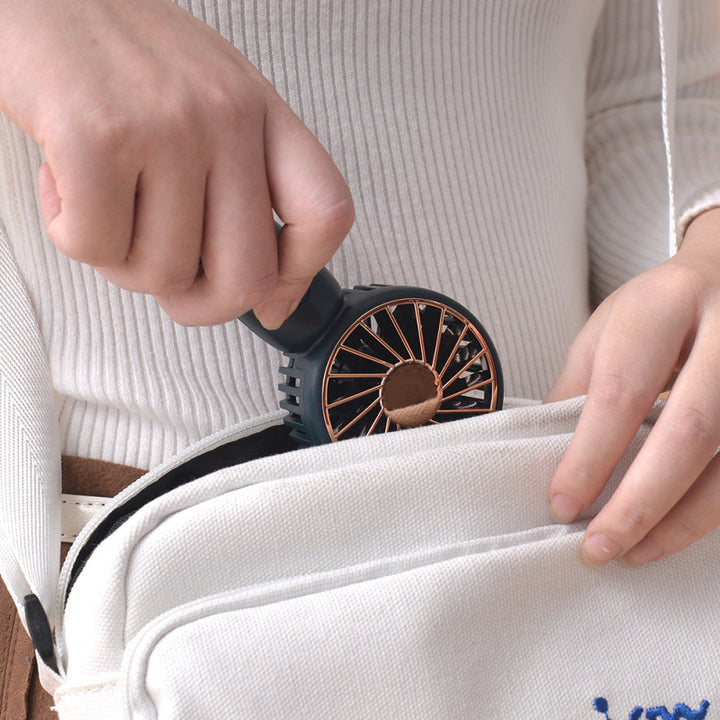 Unisex nan Portable Hand Fan with rechargeable battery, quiet motor and compact base Kalsten