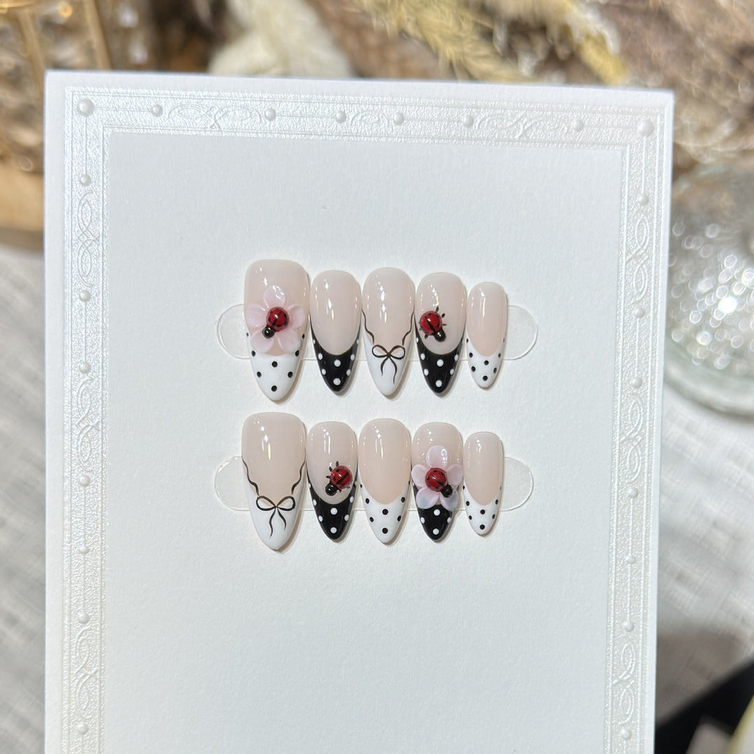 Artistic Stiletto Press-On Nail Set with Floral and Insect Designs Kalsten