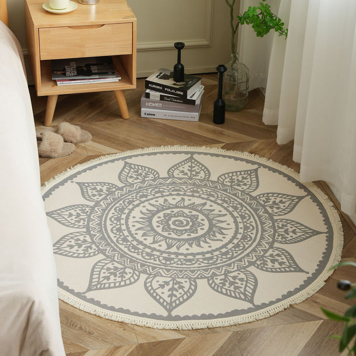Round woven rug with mandala motif, flat cotton-jute mix and fringes Kalsten