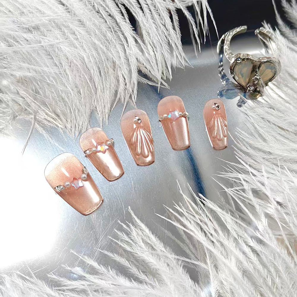 Exquisite artificial nails with glitter and pearl accents Kalsten