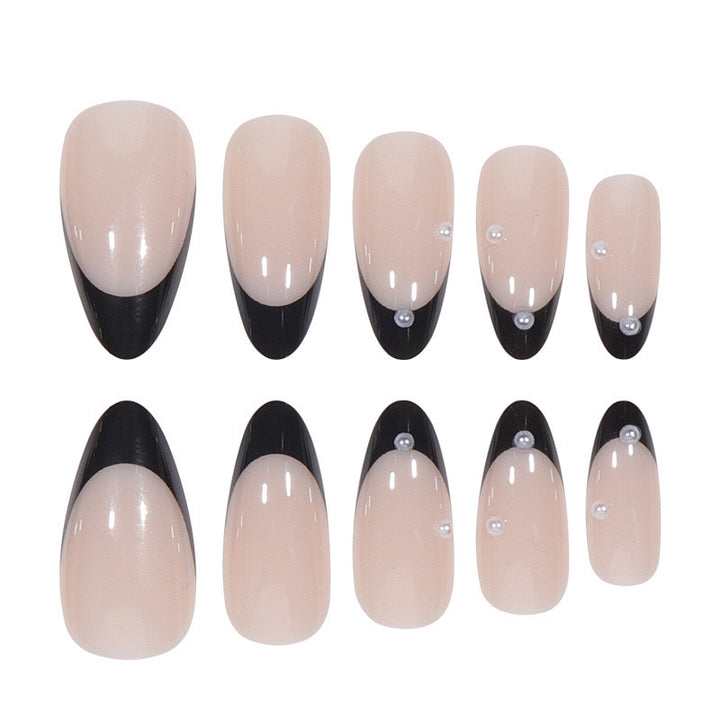 Artificial nail set with glossy French design and delicate 3D accents Kalsten