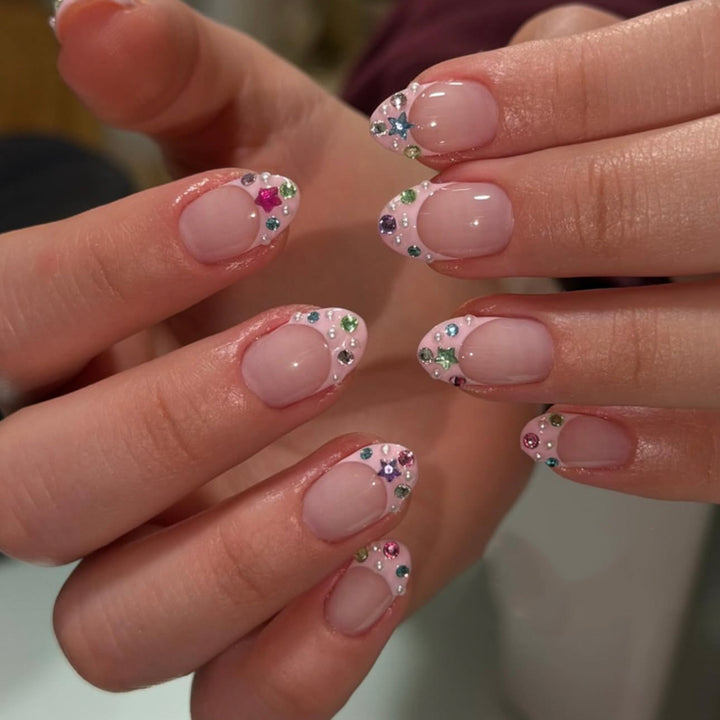 Artful stiletto nails with glitter accents Kalsten