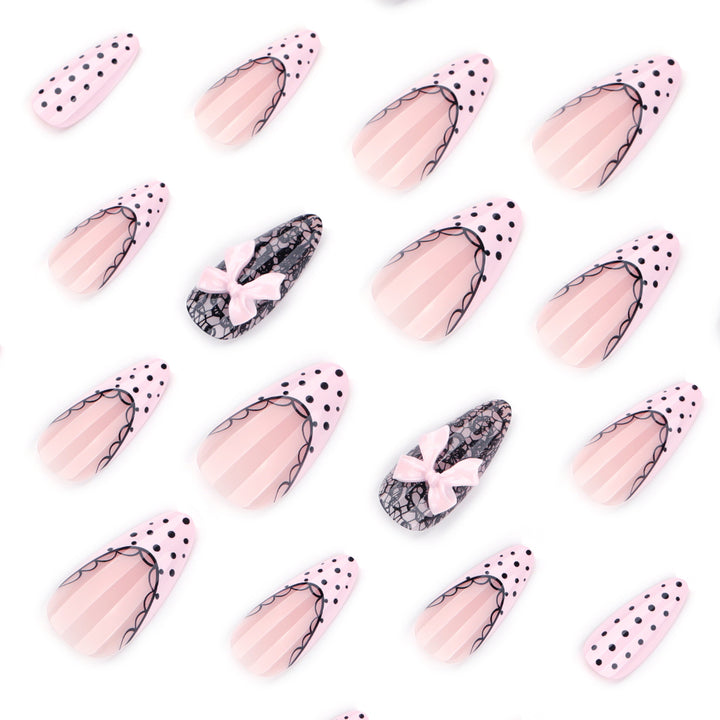 Elegant and artistic stiletto nails with tips and bows Kalsten