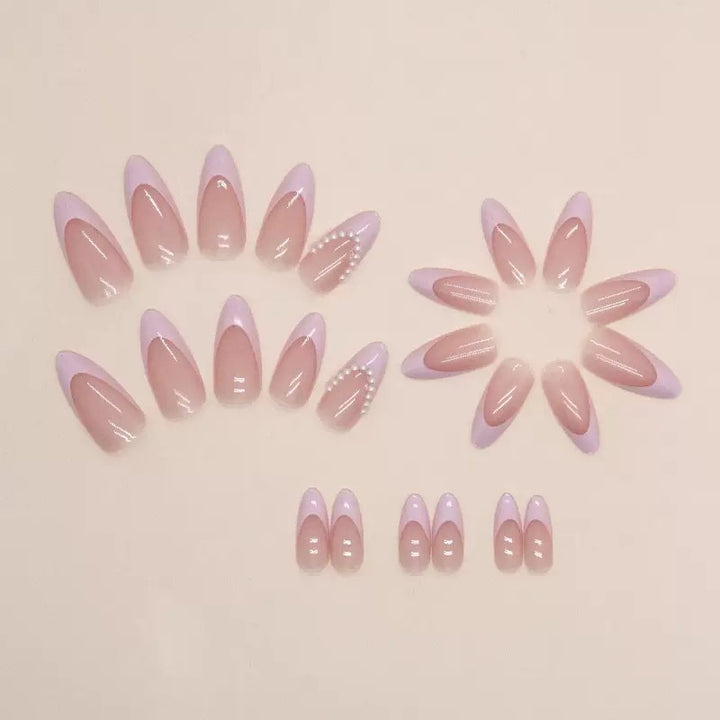 Elegant artificial nail tips with glitter and pearl decorations Kalsten