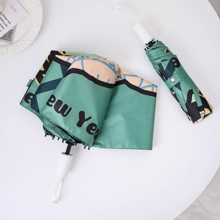 Ladies practical folding umbrella with innovative drip design Kalsten