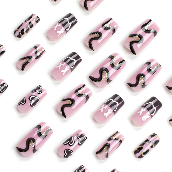 Artful nail extensions in elegant design with gold accents Kalsten