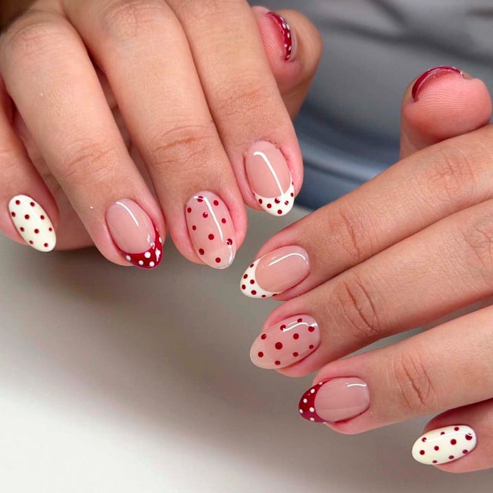 Artful stiletto nails with cute dots and accentuated color gradients Kalsten