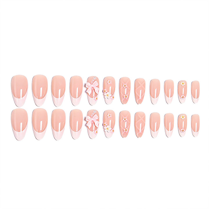 Artful Nail Tips with Ribbons and Floral Decorations Kalsten
