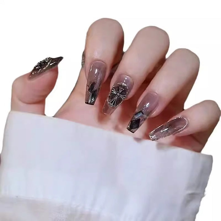 Glamorous artificial nails with heart design and glittering accents Kalsten