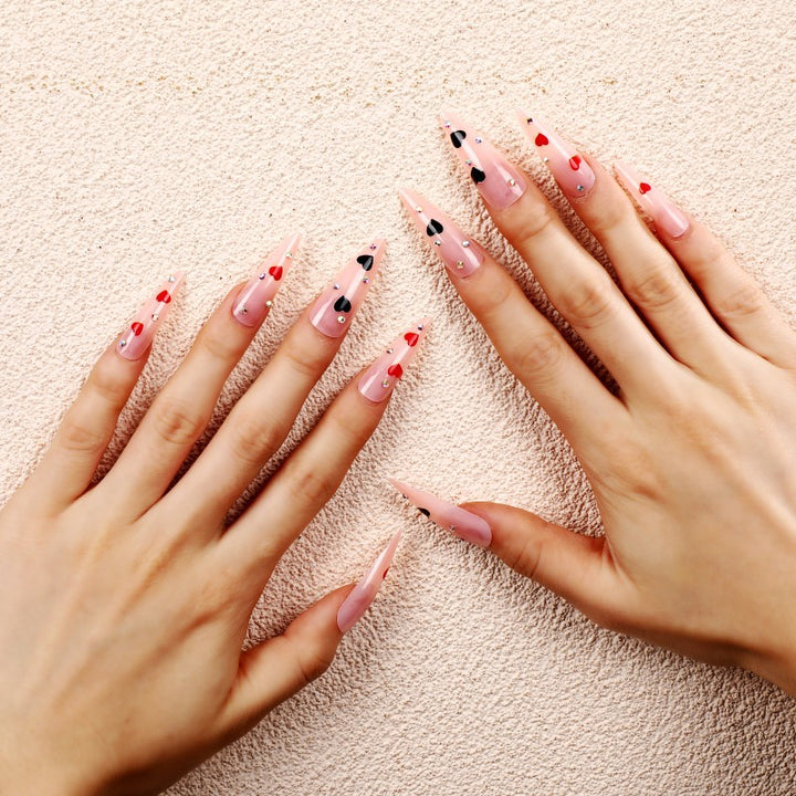 Glamorous artificial nails with heart accents Kalsten