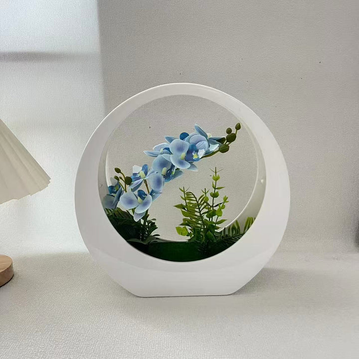 Decorative Orchid Plant in Modern Circular Vase