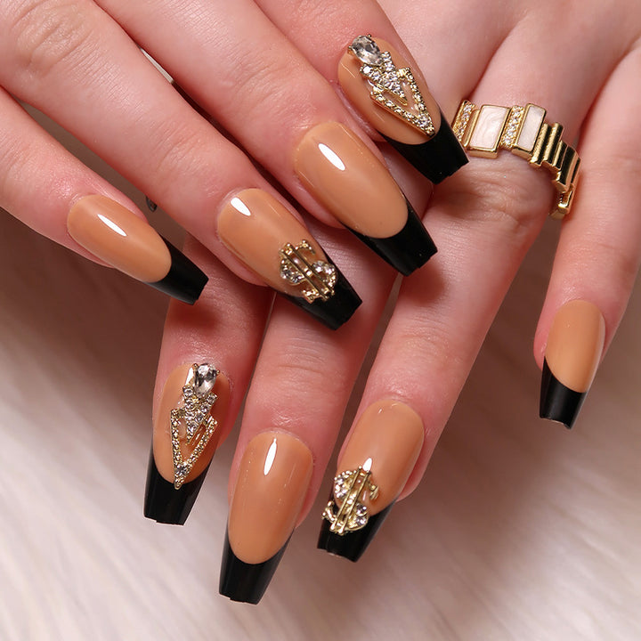 Glamorous artificial nails with rhinestones and black tips Kalsten