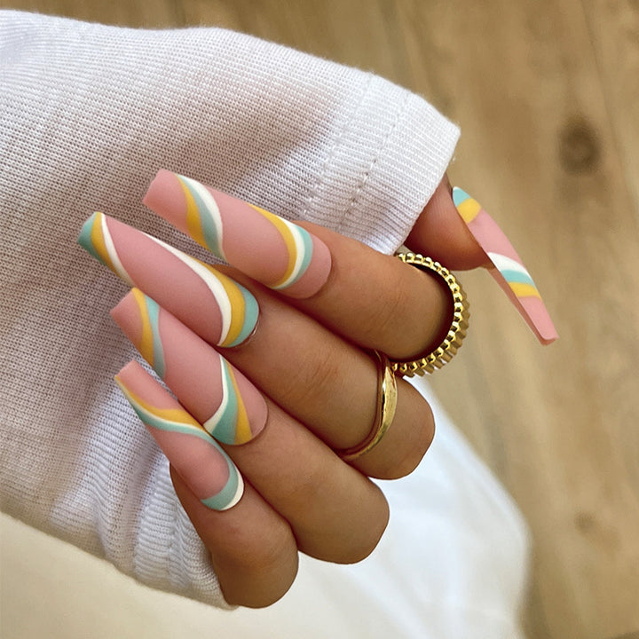 Artificial nail extensions with modern wave design Kalsten