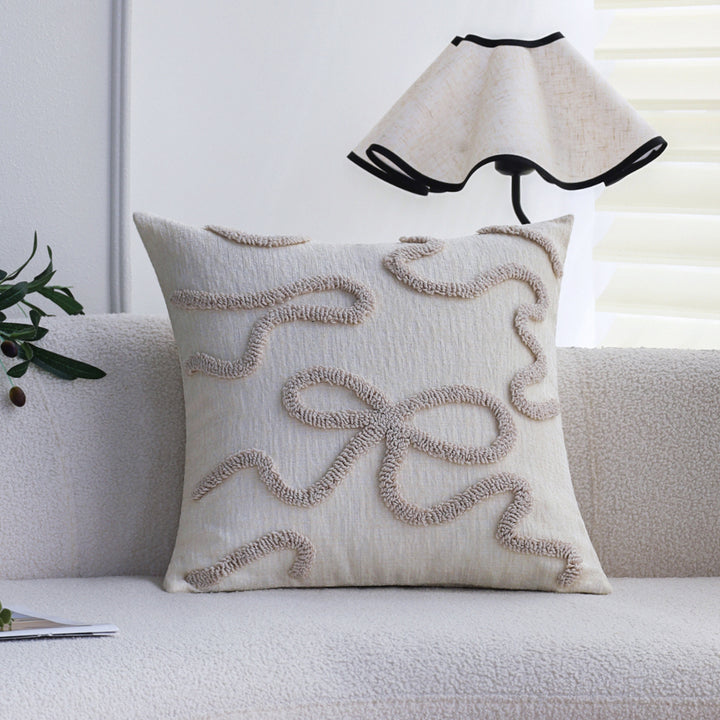 Square decorative cushion cover with hand-tufted bow and wave relief made of cotton-linen mix Kalsten