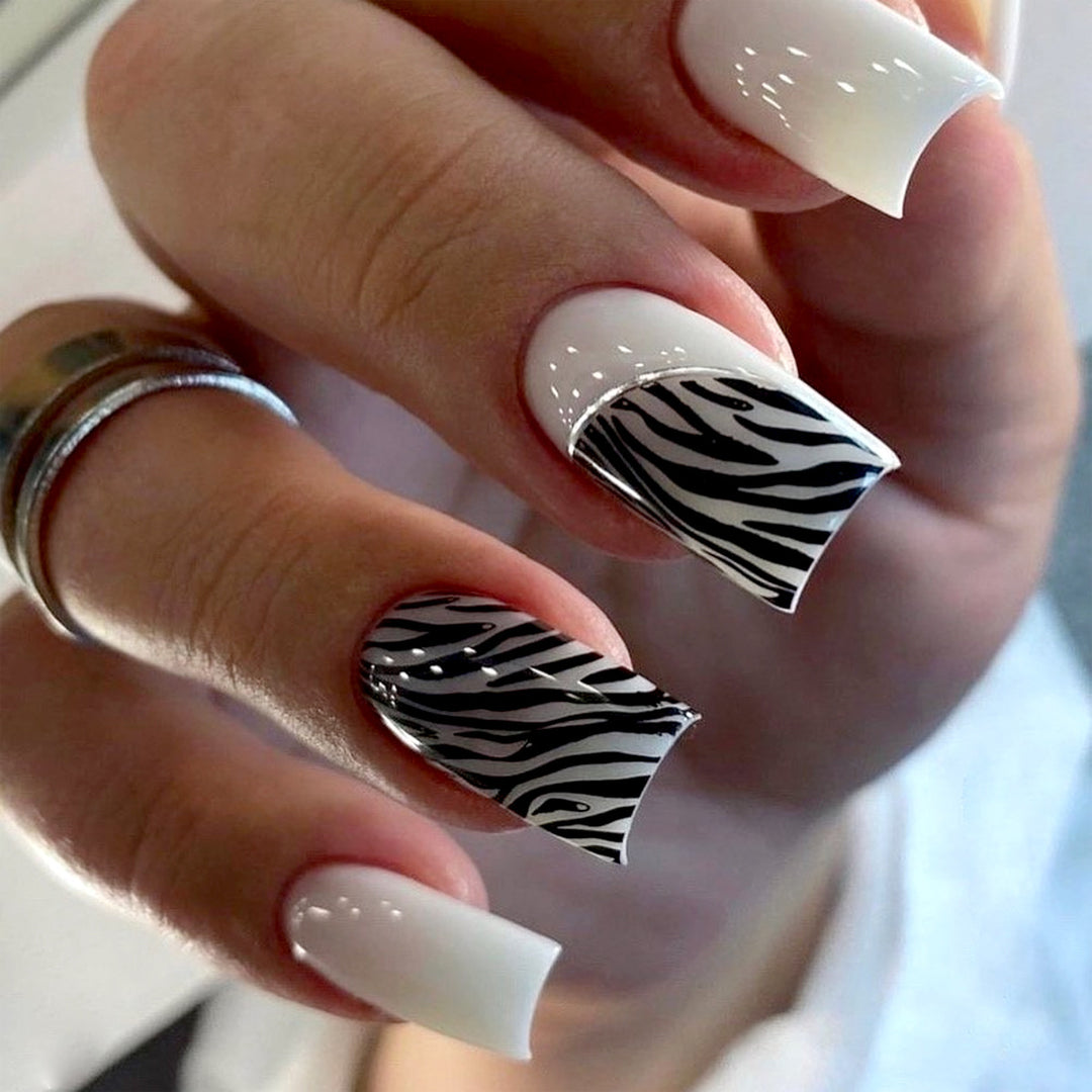 Artful nail extensions with stylish zebra pattern Kalsten
