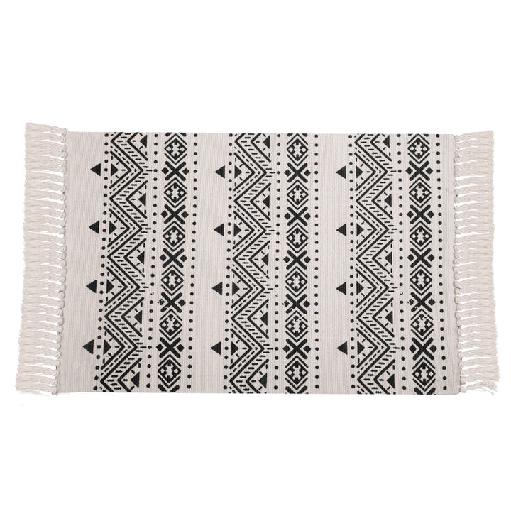 Flat-woven cotton runner with Mediterranean tile jacquard and decorative fringes Kalsten