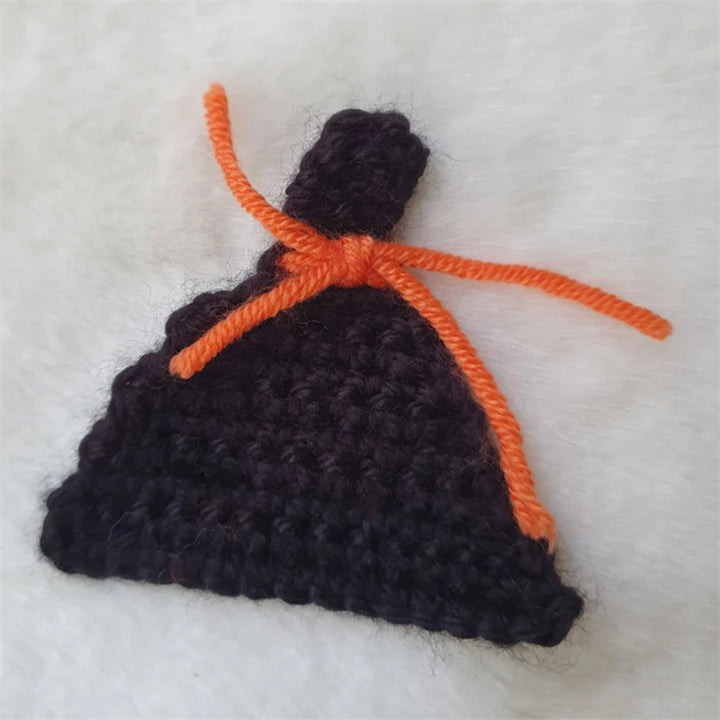 Hand-crocheted pumpkin pot holder and table mat made of cotton yarn