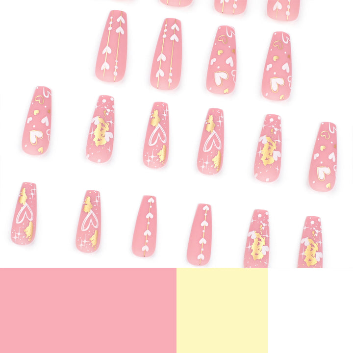 Artificial nail art with heart and glitter designs Kalsten
