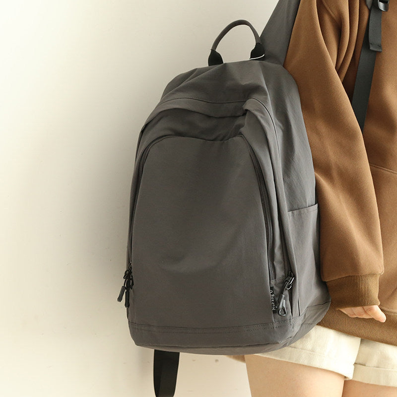 Practical everyday backpack with reinforced bottom and versatile compartments Kalsten