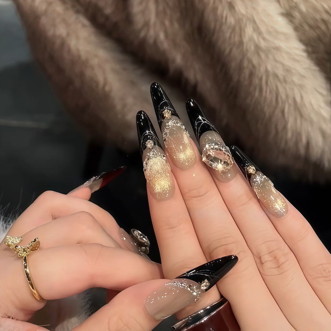 Glamorous artificial nails with extravagant rhinestone and glitter insets Kalsten
