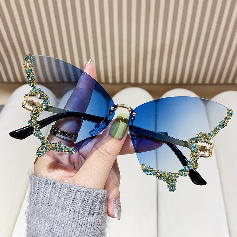 Women's extravagant sunglasses with sparkling butterfly design Kalsten