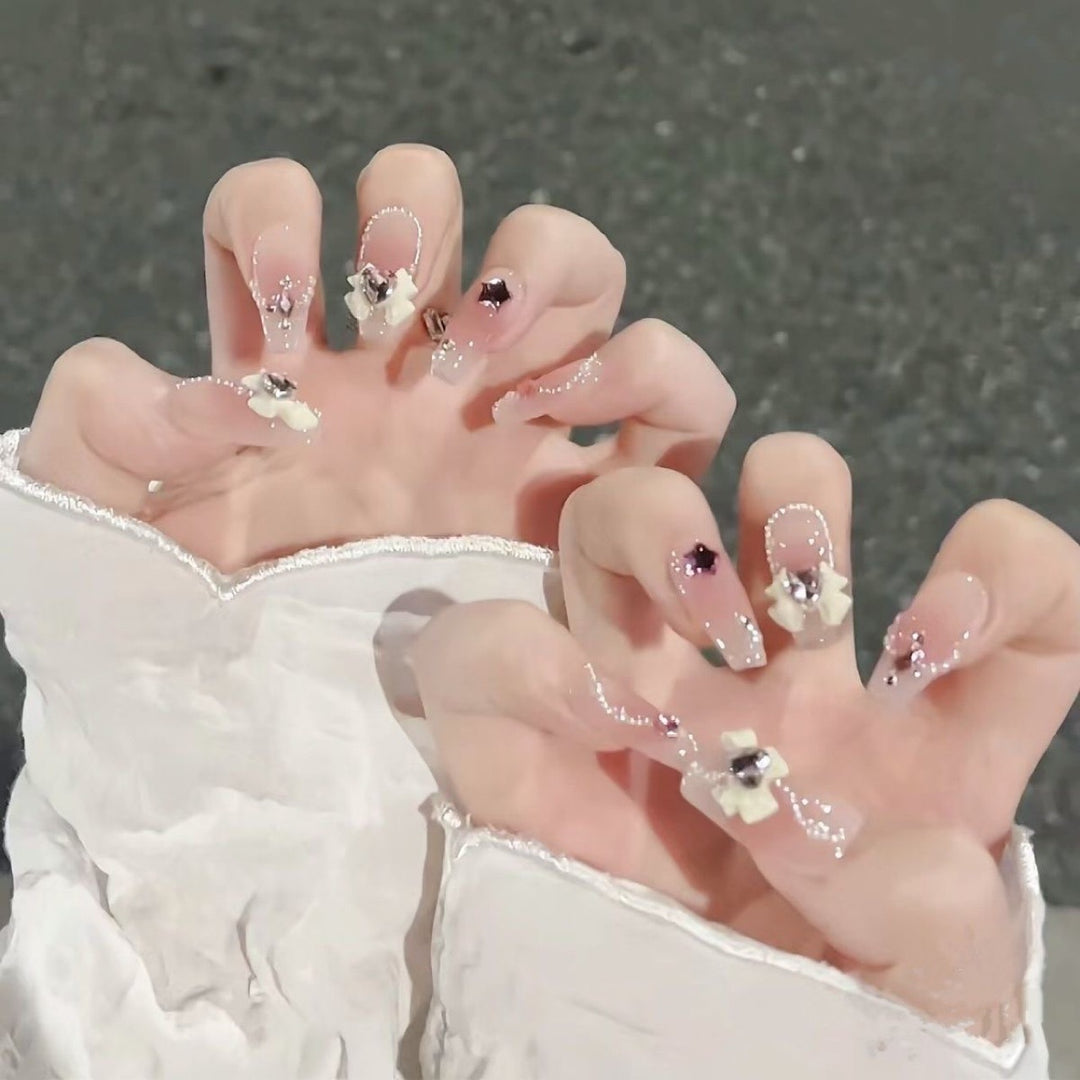 Artificial nails with floral accents Kalsten