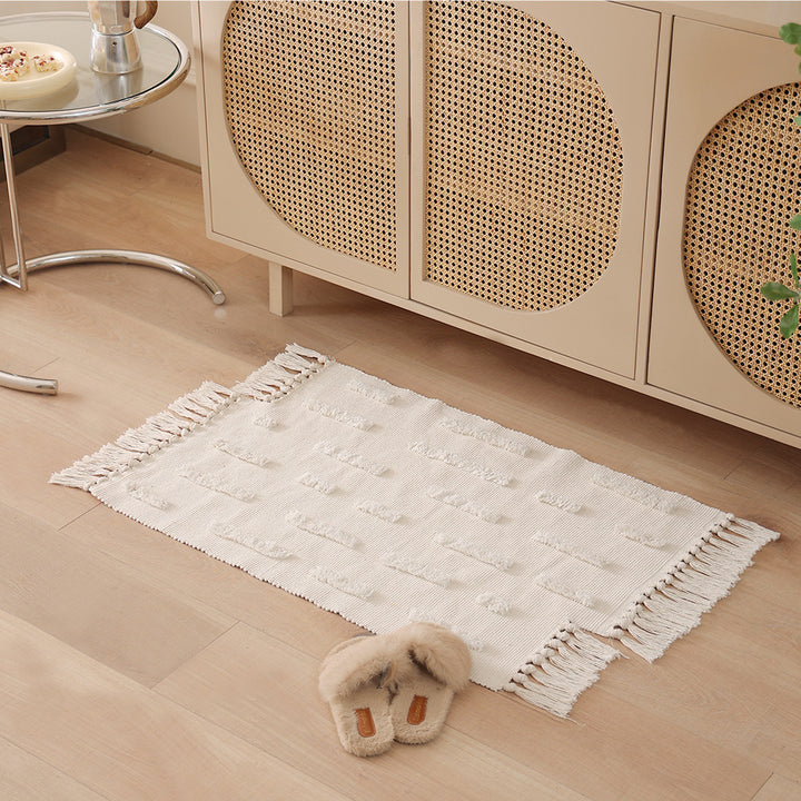 Woven rug in Boho-minimalist style with contrasted tufting and cotton fringes Kalsten