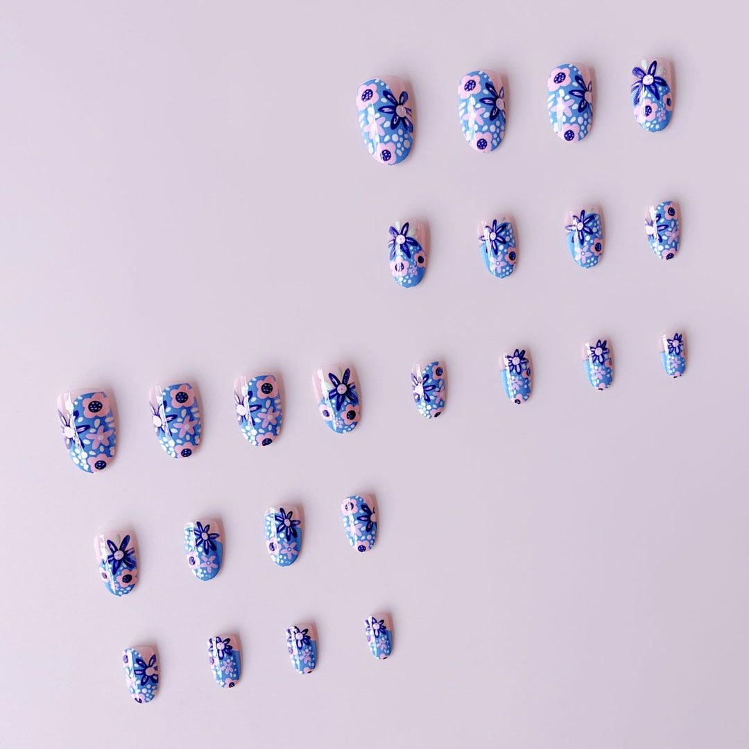 Nail art set with floral accents and vibrant patterns Kalsten