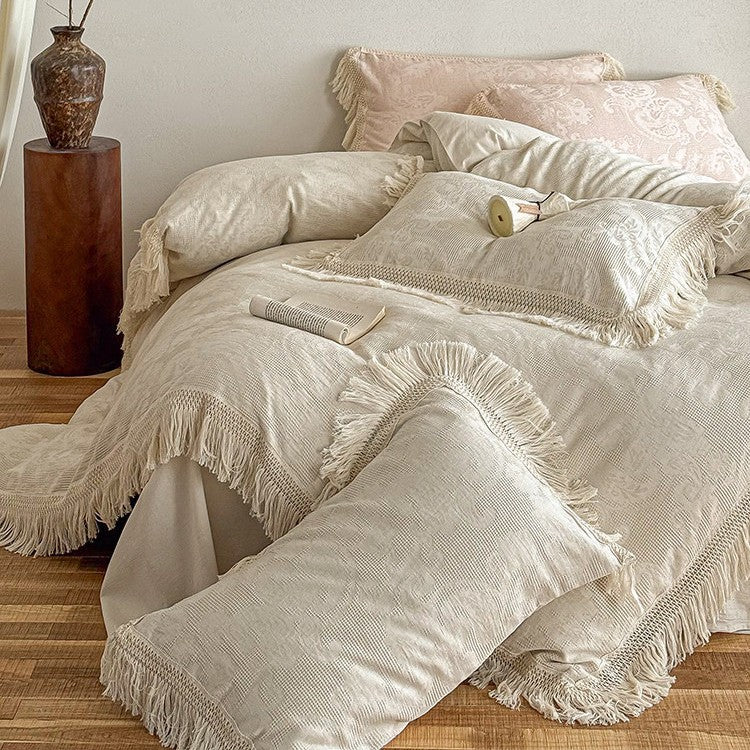 High-quality jacquard bed linen set with decorative fringed trim made of cotton satin