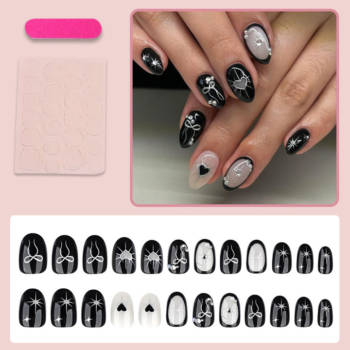 Artificial nail set with elegant bow and heart design Kalsten