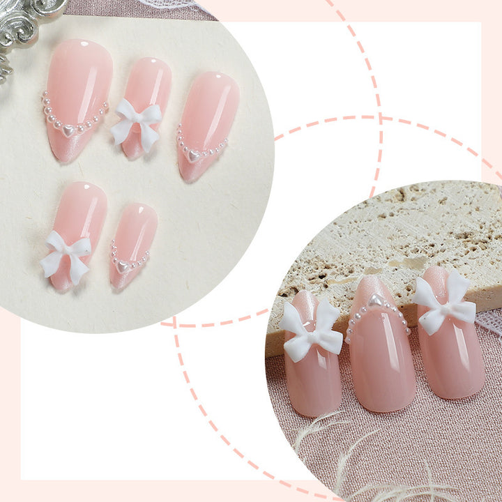 Artificial nail set with elegant bows and pearl embellishments Kalsten